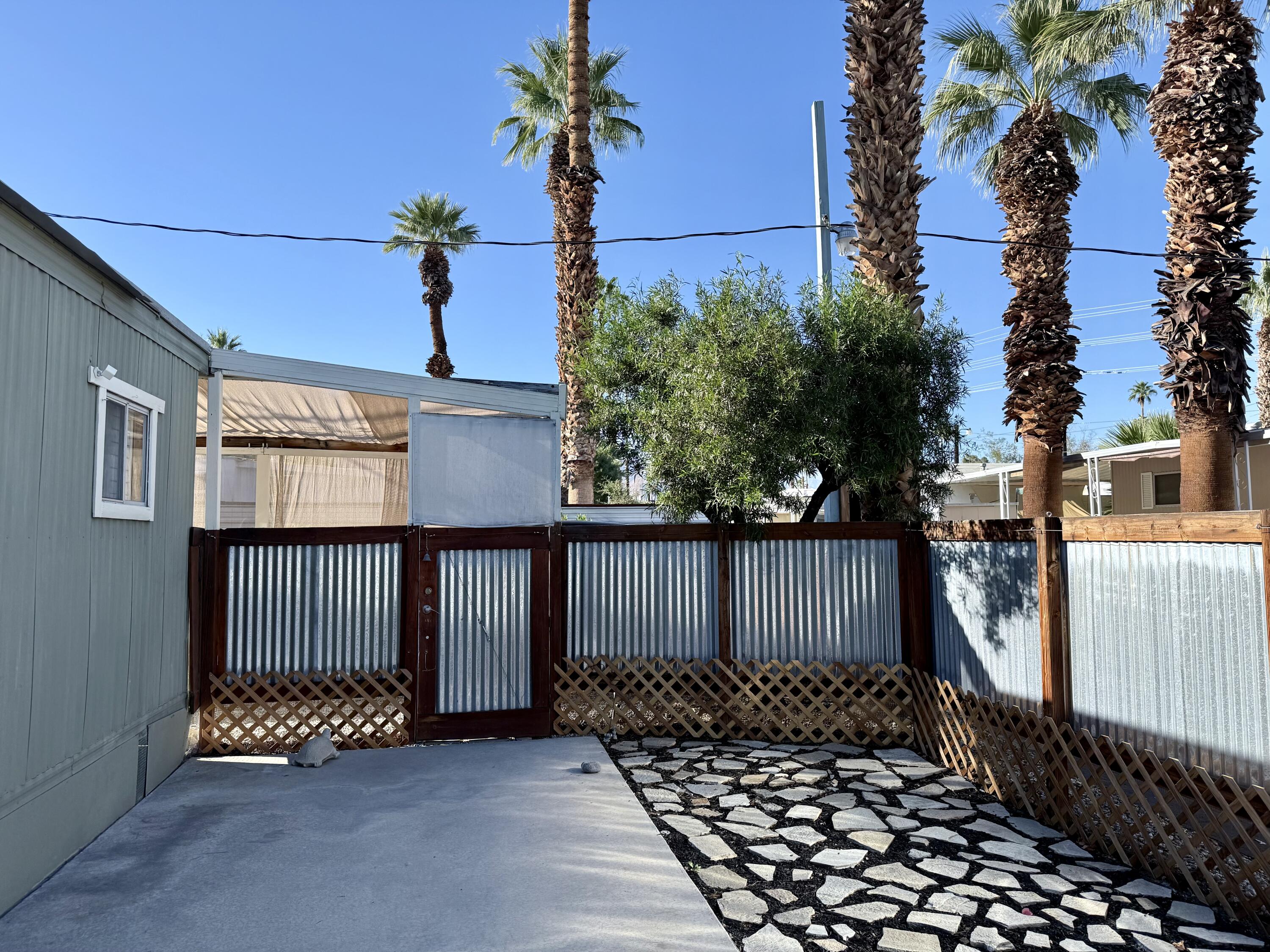 22 Jupiter Street Palm Springs, CA 92264 - Photo 5 of 35 a view of a house with a garden