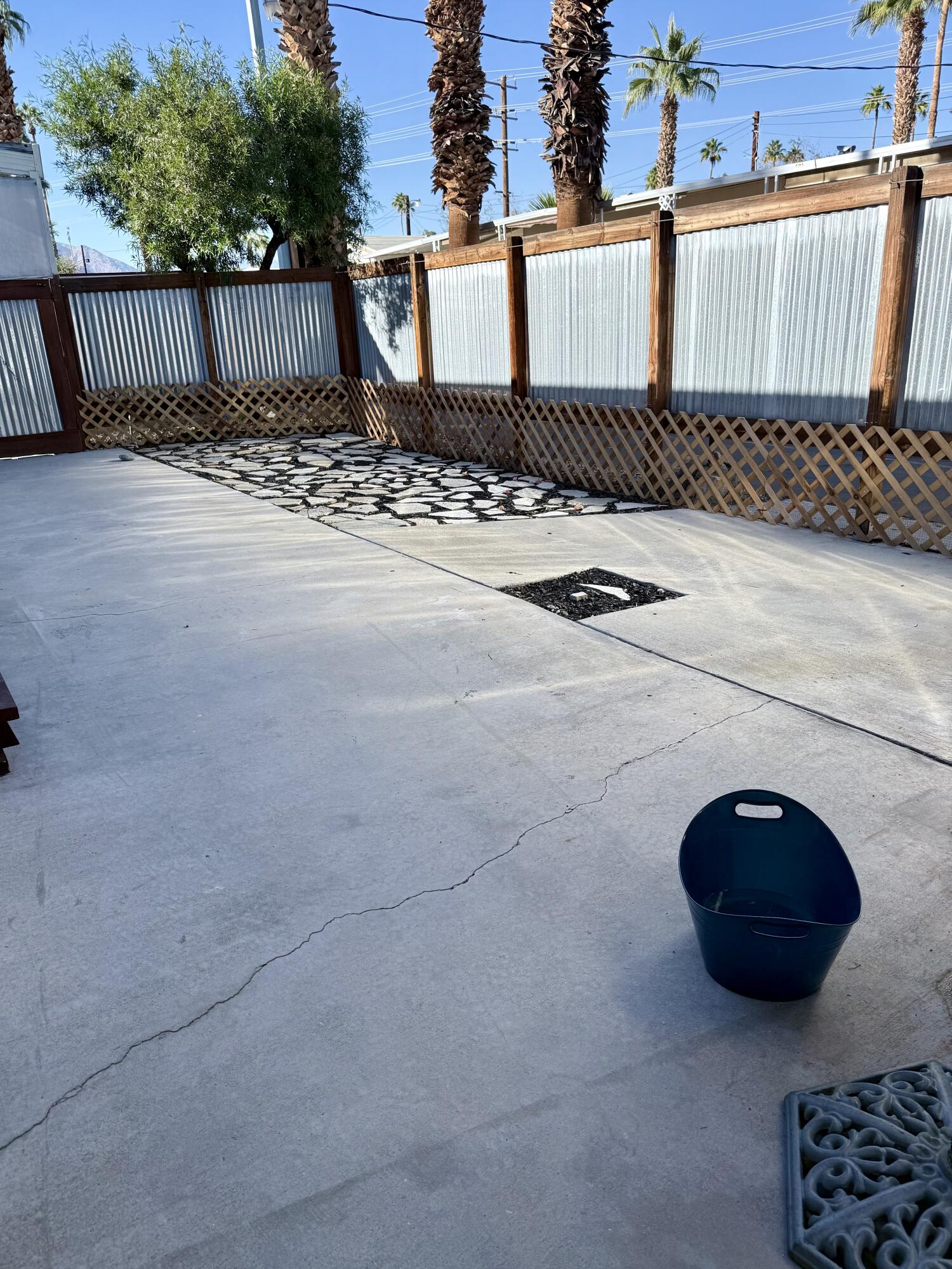 22 Jupiter Street Palm Springs, CA 92264 - Photo 6 of 35 a backyard of a house with table and chairs