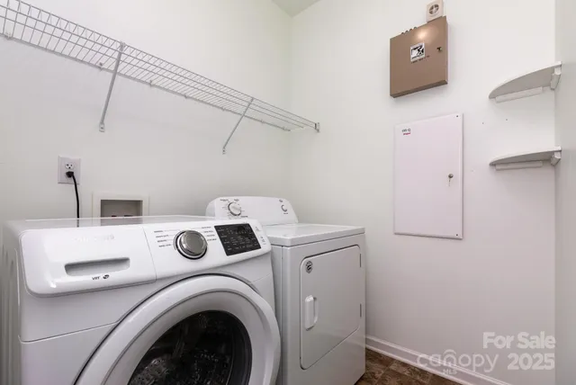 a utility room with dryer and washer