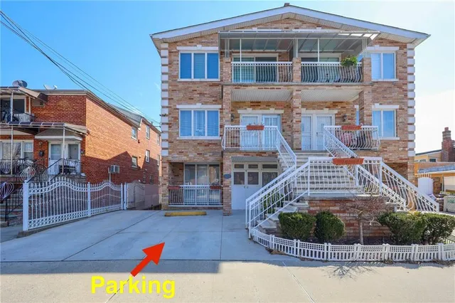 a front view of a house with swimming pool