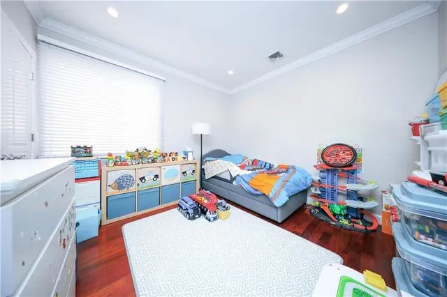 a room with furniture and a wooden floor