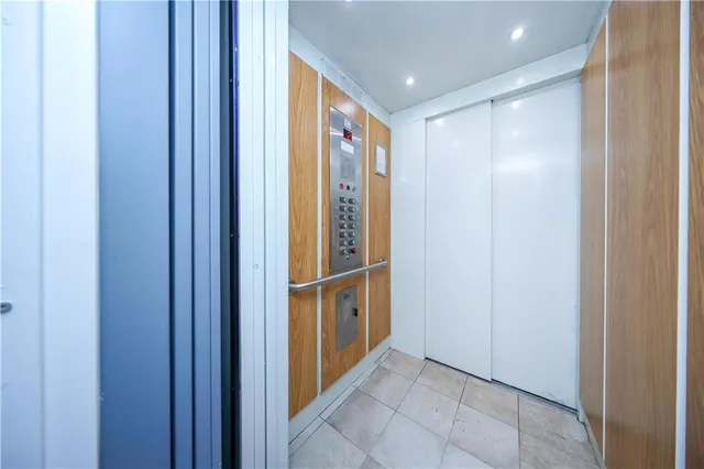 a view of elevator with hallway