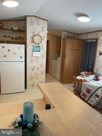 a bedroom with a bed and cabinets