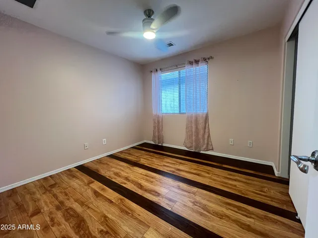 a view of room with window and stairs