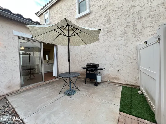 an outdoor space with furniture