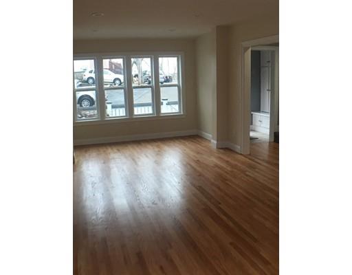 12 Johnston Terrace Saugus, MA 01906 - Photo 11 of 24 a view of an empty room with wooden floor and a window