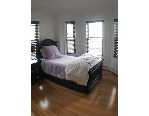 12 Johnston Terrace Saugus, MA 01906 - Photo 13 of 24 a bedroom with a bed and window