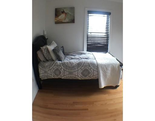 12 Johnston Terrace Saugus, MA 01906 - Photo 14 of 24 a bedroom with a bed and a window