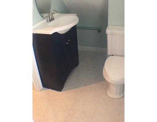 12 Johnston Terrace Saugus, MA 01906 - Photo 19 of 24 a bathroom with a sink toilet and vanity