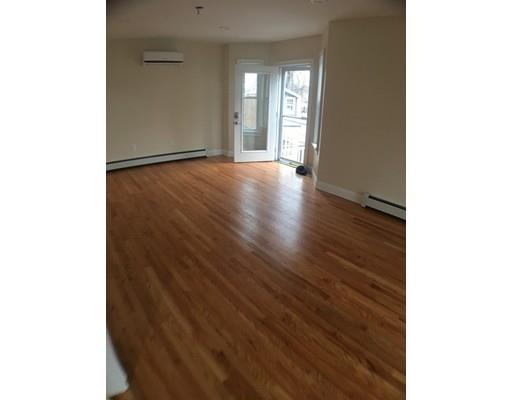 12 Johnston Terrace Saugus, MA 01906 - Photo 9 of 24 a view of an empty room with wooden floor and a window
