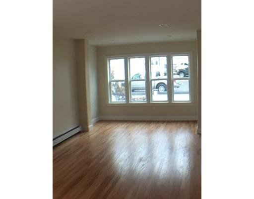 12 Johnston Terrace Saugus, MA 01906 - Photo 10 of 24 a view of an empty room with wooden floor and a window