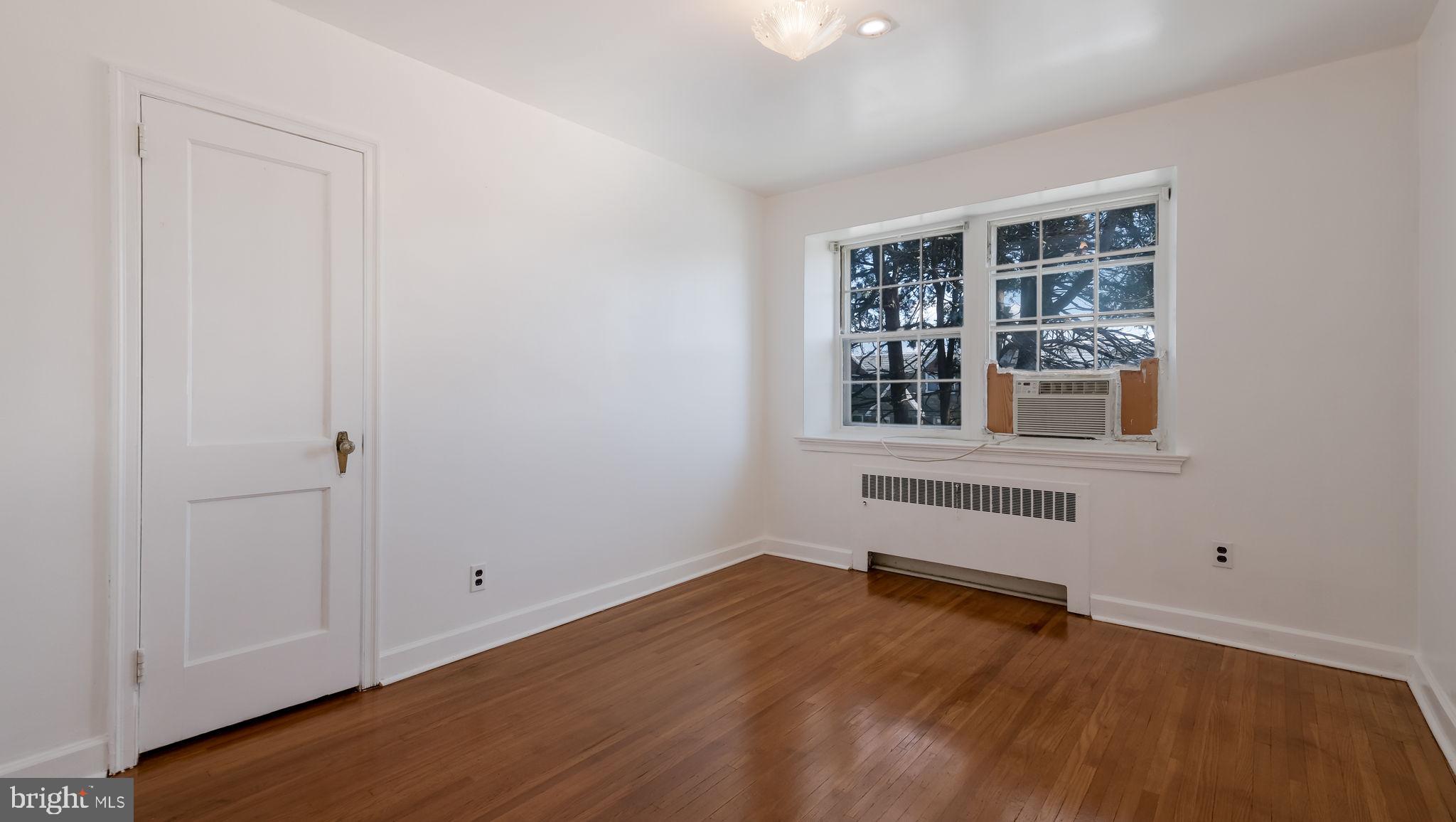 1500 Hellerman Street Philadelphia, PA 19149 - Photo 17 of 31 wooden floor and windows in a room