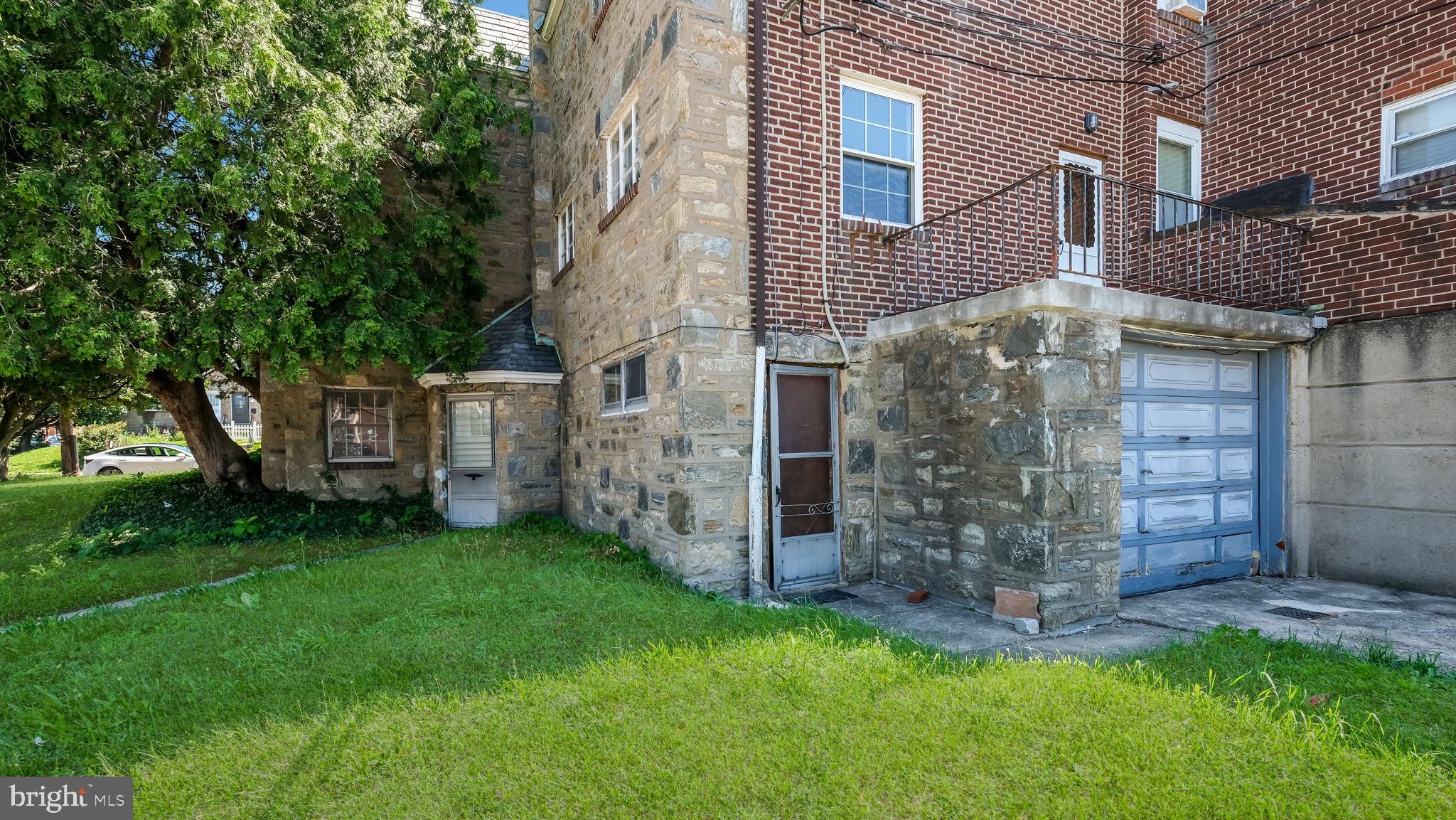 1500 Hellerman Street Philadelphia, PA 19149 - Photo 4 of 31 front view of a house with a yard