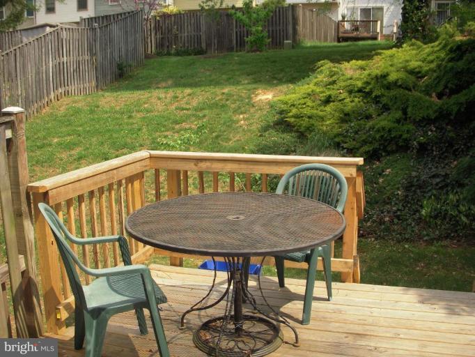 9027 Saffron Lane Silver Spring, MD 20901 - Photo 23 of 30 Large Deck in Back with Foliage
