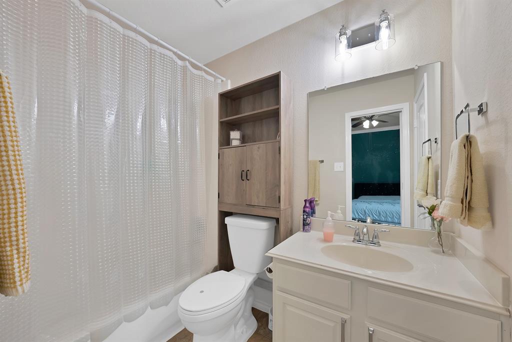 3822 Spring Run Lane Melissa, TX 75454 - Photo 35 of 39 a bathroom with a sink toilet and shower