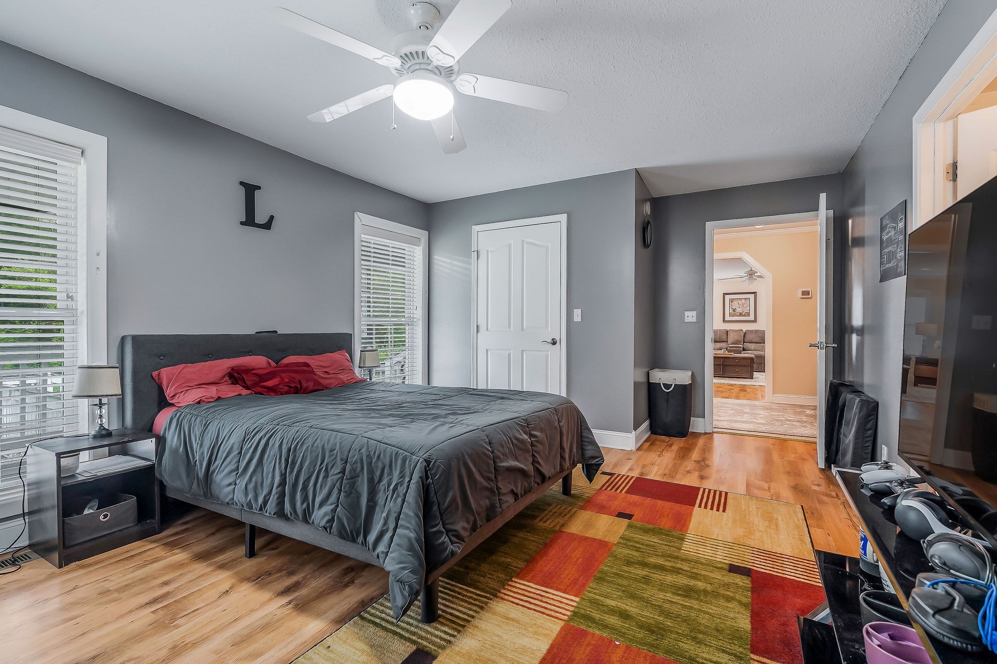 341 Pumpkin Hollow Road Liberty, TN 37095 - Photo 14 of 52 a bedroom with a bed and a flat tv screen on dresser