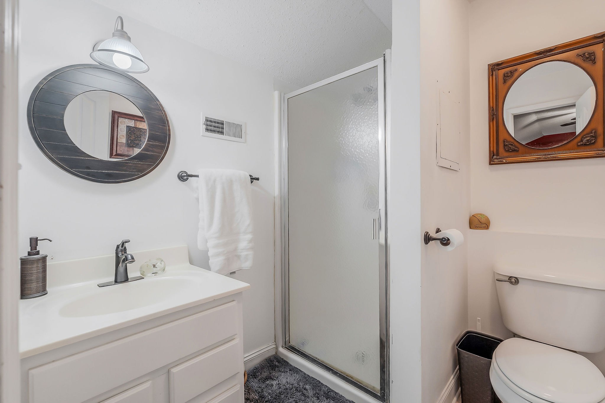 341 Pumpkin Hollow Road Liberty, TN 37095 - Photo 25 of 52 a bathroom with a sink a mirror and a toilet