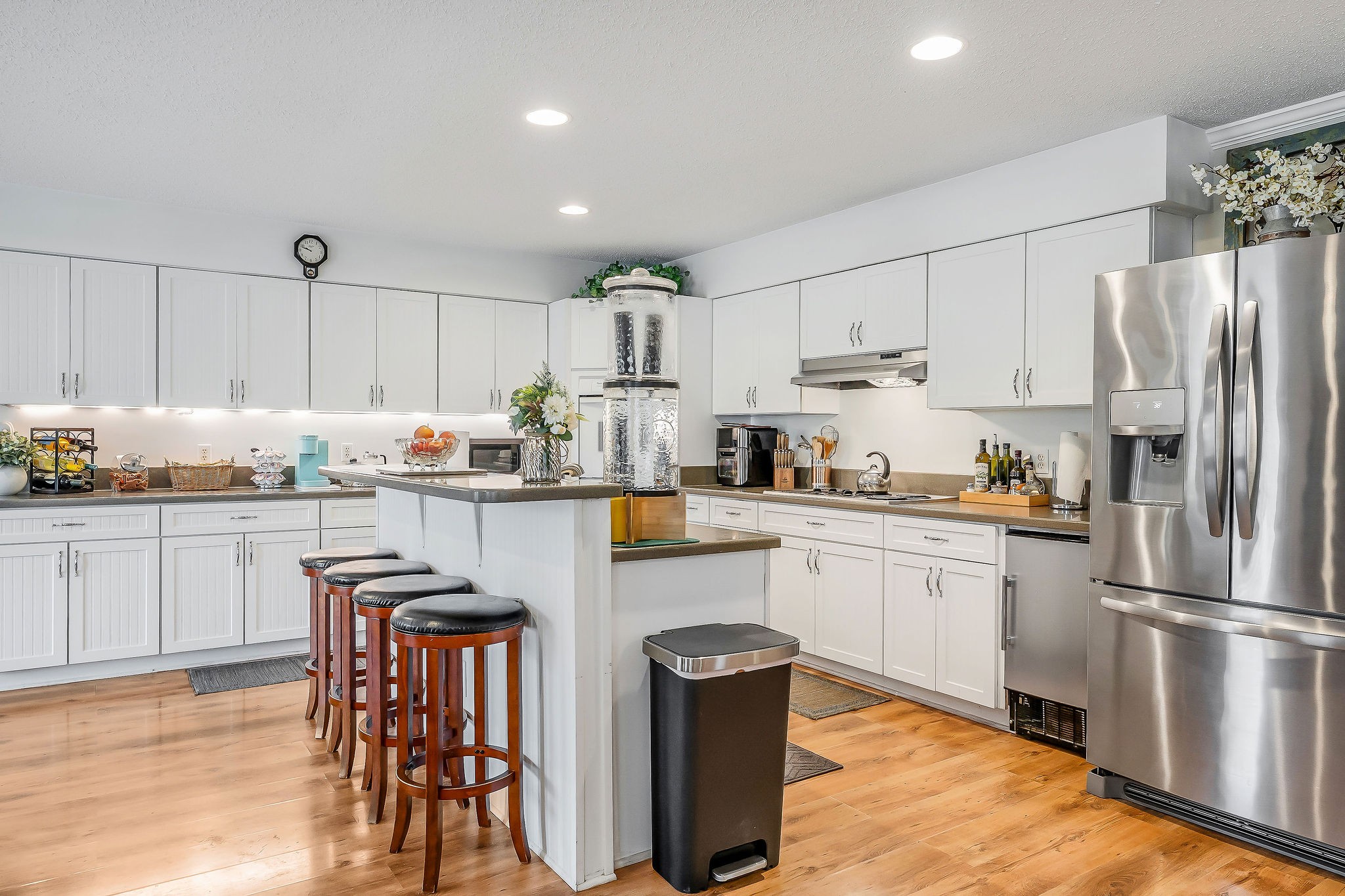 341 Pumpkin Hollow Road Liberty, TN 37095 - Photo 4 of 52 a kitchen with granite countertop a refrigerator stove top oven and cabinets
