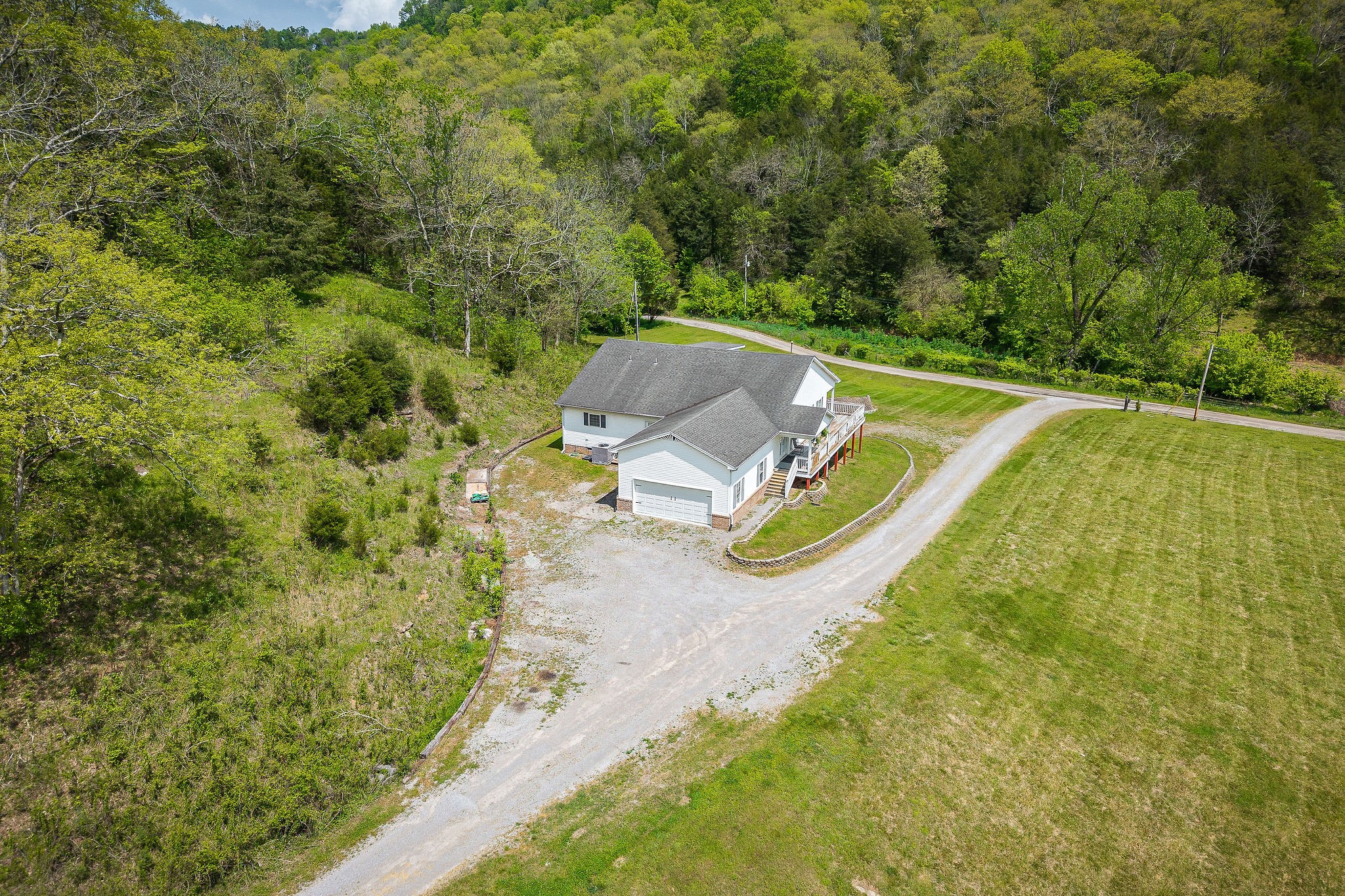 341 Pumpkin Hollow Road Liberty, TN 37095 - Photo 51 of 52 an aerial view of a house with a yard and swimming pool
