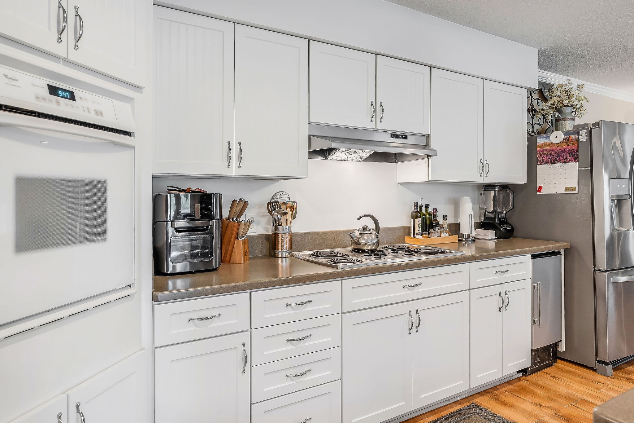 341 Pumpkin Hollow Road Liberty, TN 37095 - Photo 6 of 52 a kitchen with white cabinets and white appliances