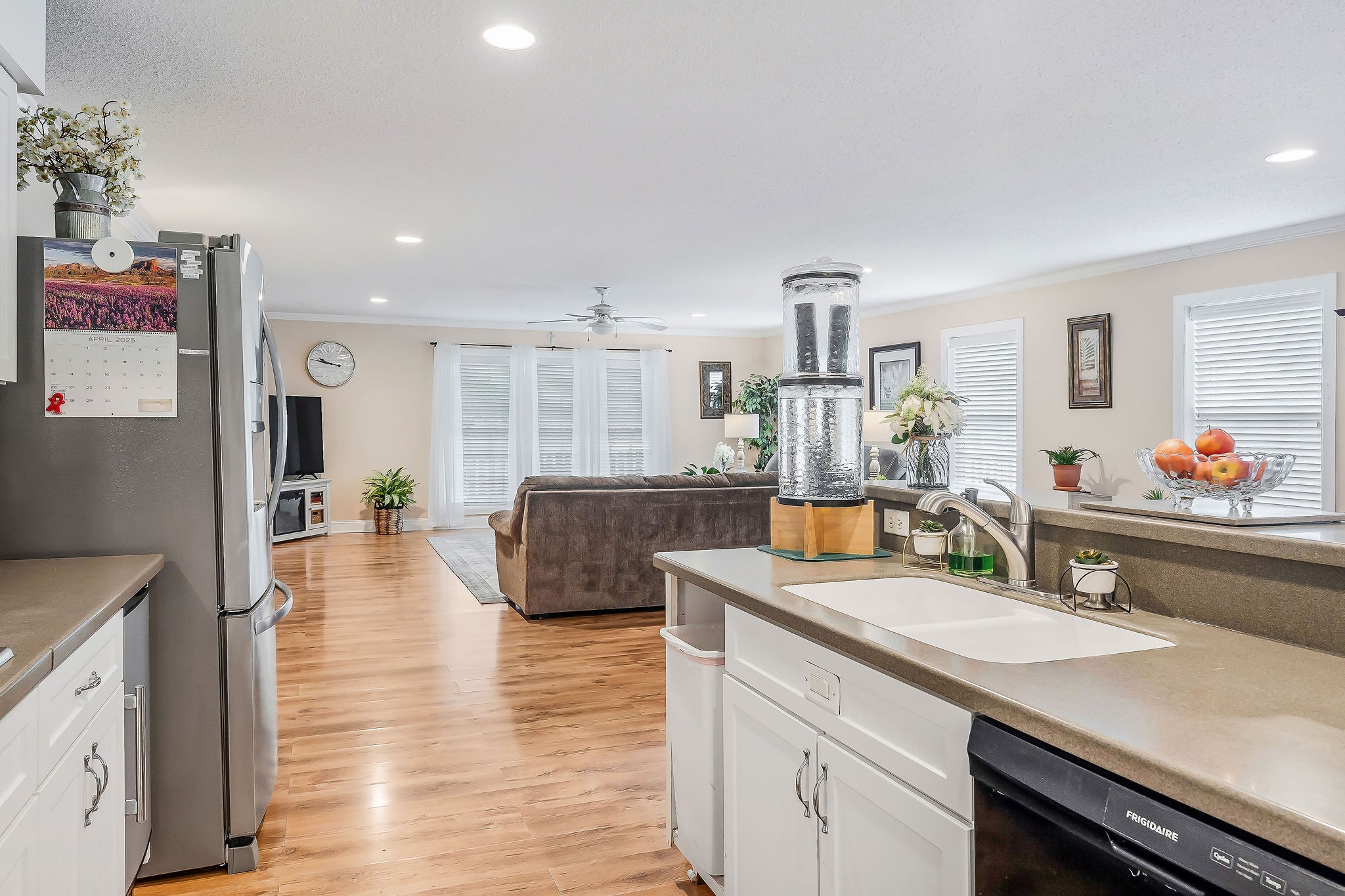 341 Pumpkin Hollow Road Liberty, TN 37095 - Photo 7 of 52 a kitchen with stainless steel appliances granite countertop a sink cabinets and wooden floor