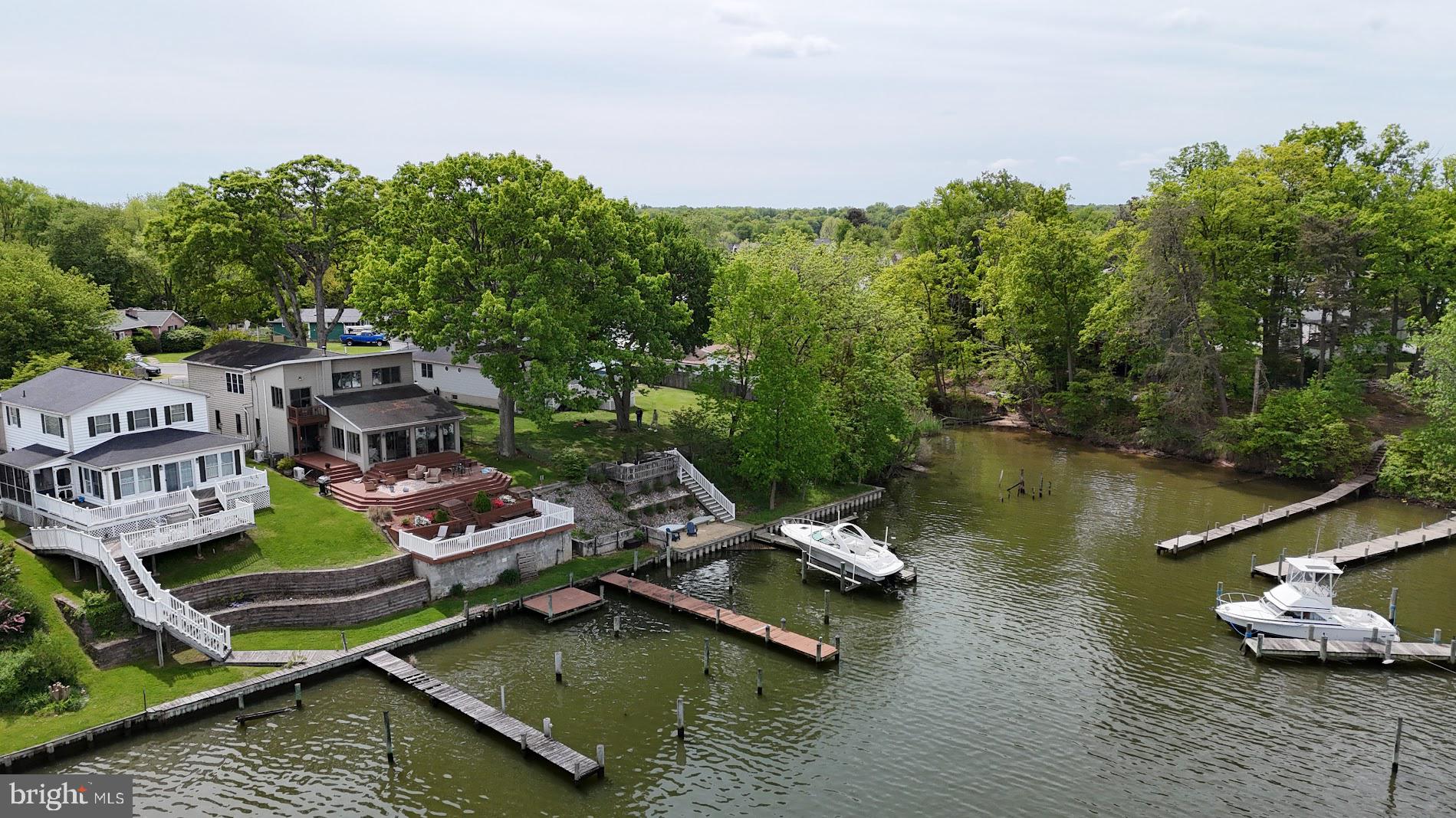 2222 Monocacy Road Essex, MD 21221 - Photo 69 of 70 Serene waterfront retreat with lush greenery.