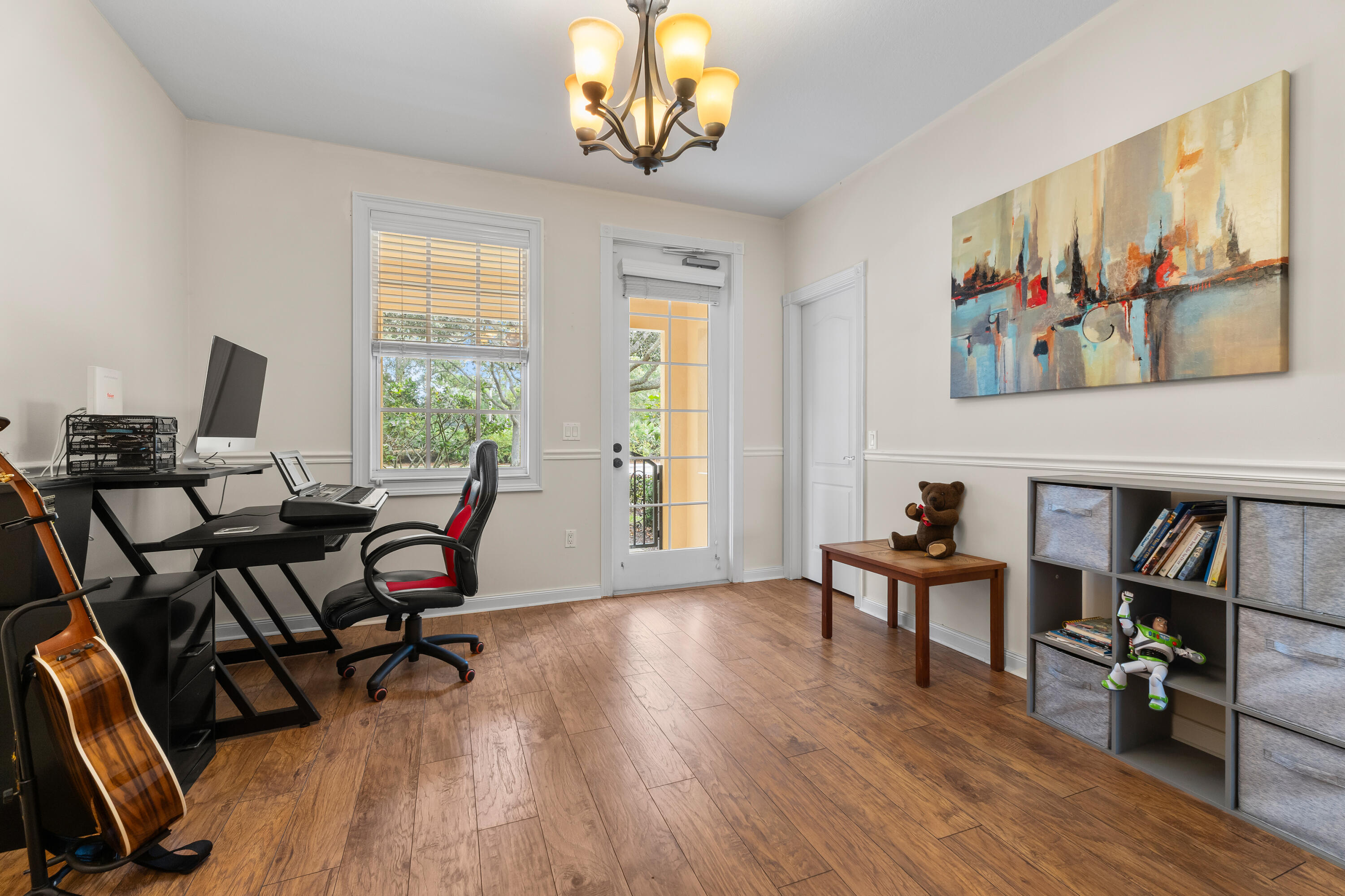 4050 Parkside Drive Jupiter, FL 33458 - Photo 25 of 59 a view of a livingroom with workspace and a window