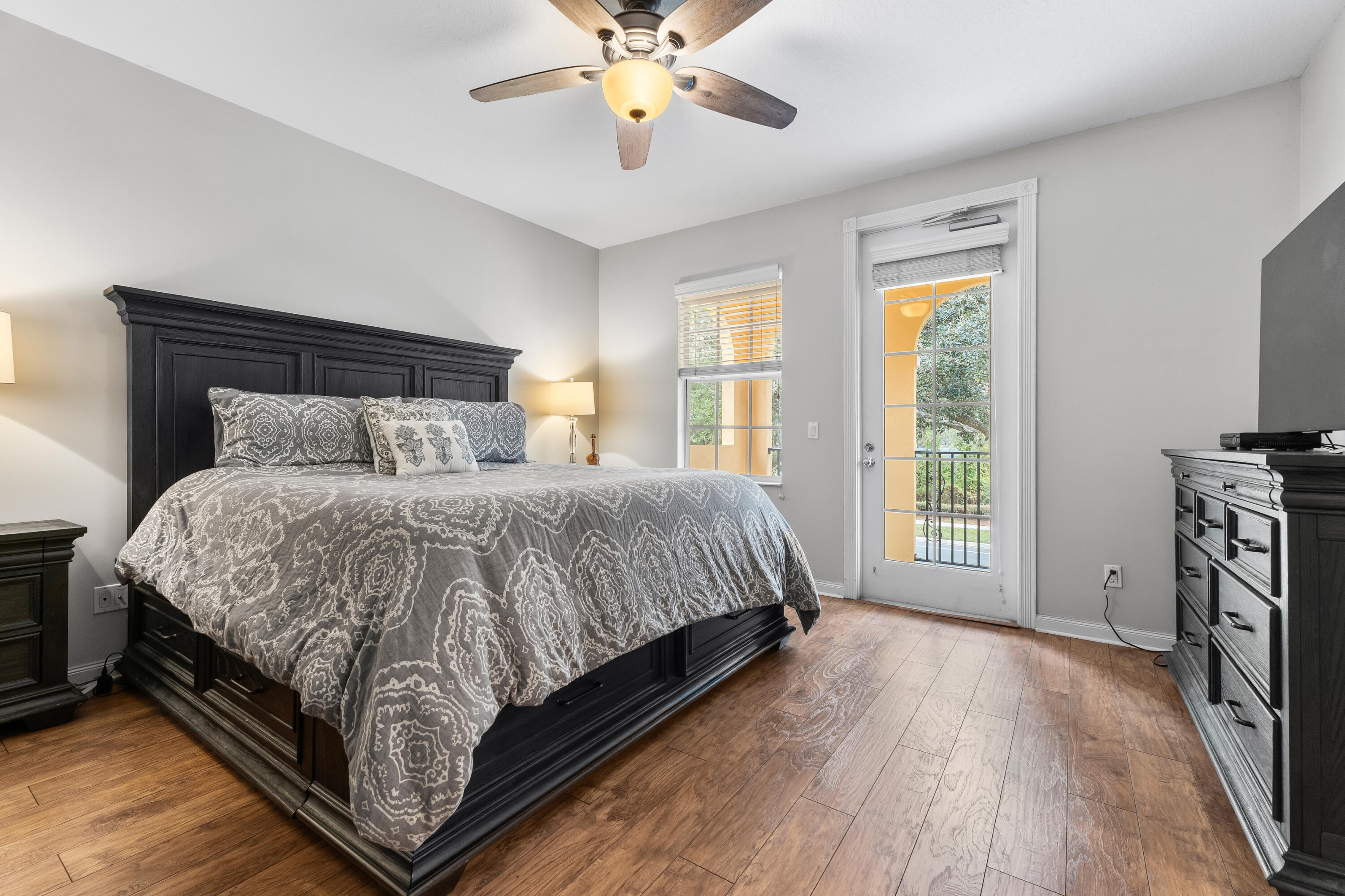 4050 Parkside Drive Jupiter, FL 33458 - Photo 29 of 59 a bed sitting in a spacious bedroom next to a window