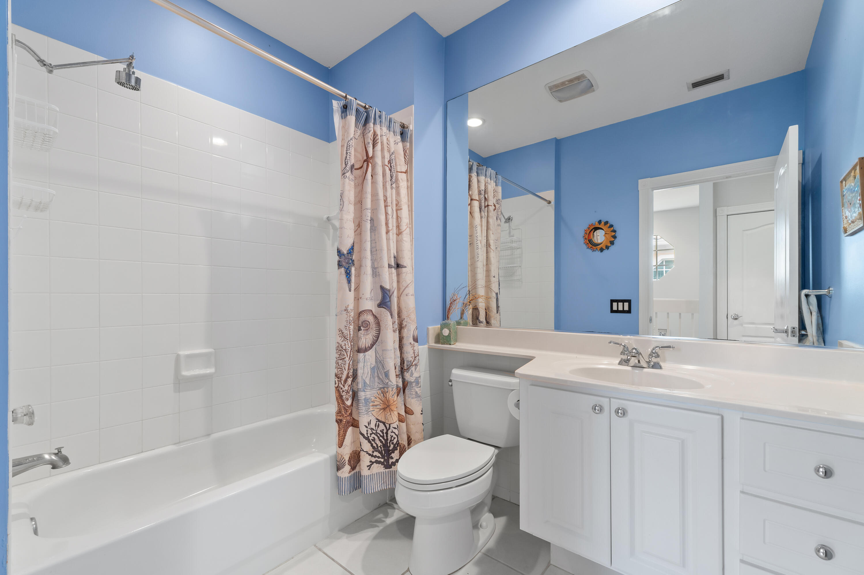 4050 Parkside Drive Jupiter, FL 33458 - Photo 37 of 59 a bathroom with a sink toilet and shower