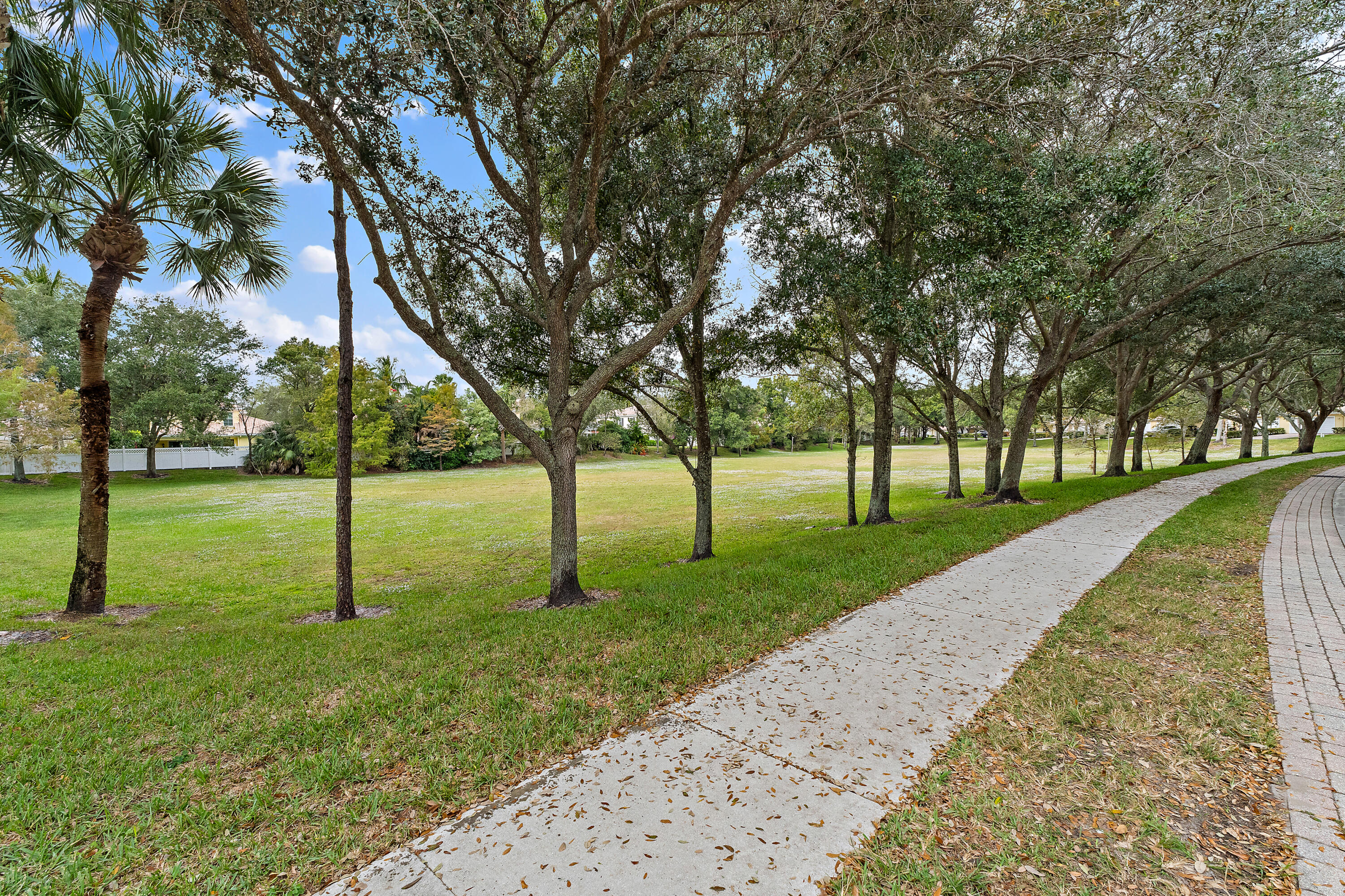 4050 Parkside Drive Jupiter, FL 33458 - Photo 49 of 59 a view of a park with large trees