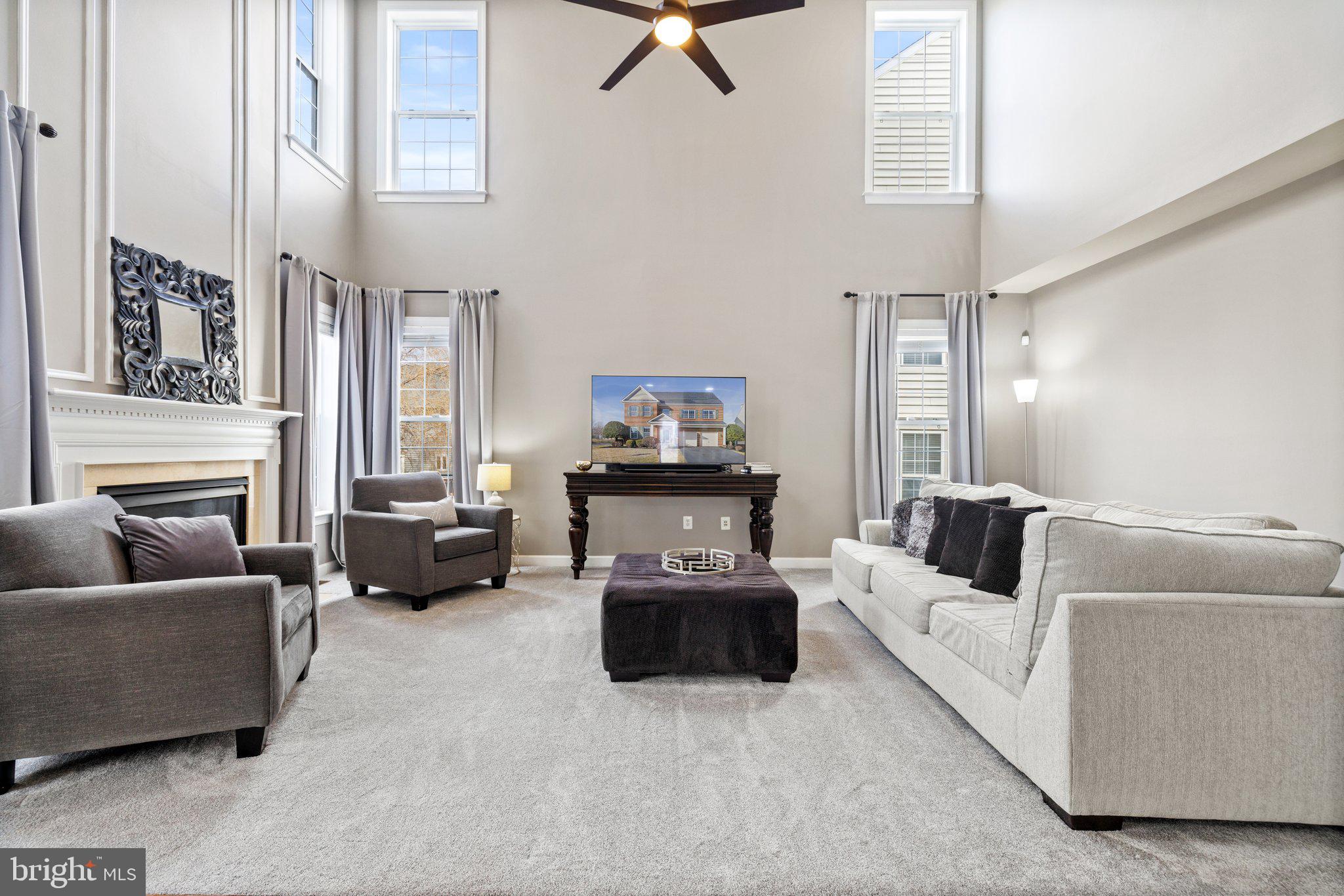 42624 Emperor Ashburn, VA 20148 - Photo 17 of 56 a living room with furniture and a couch
