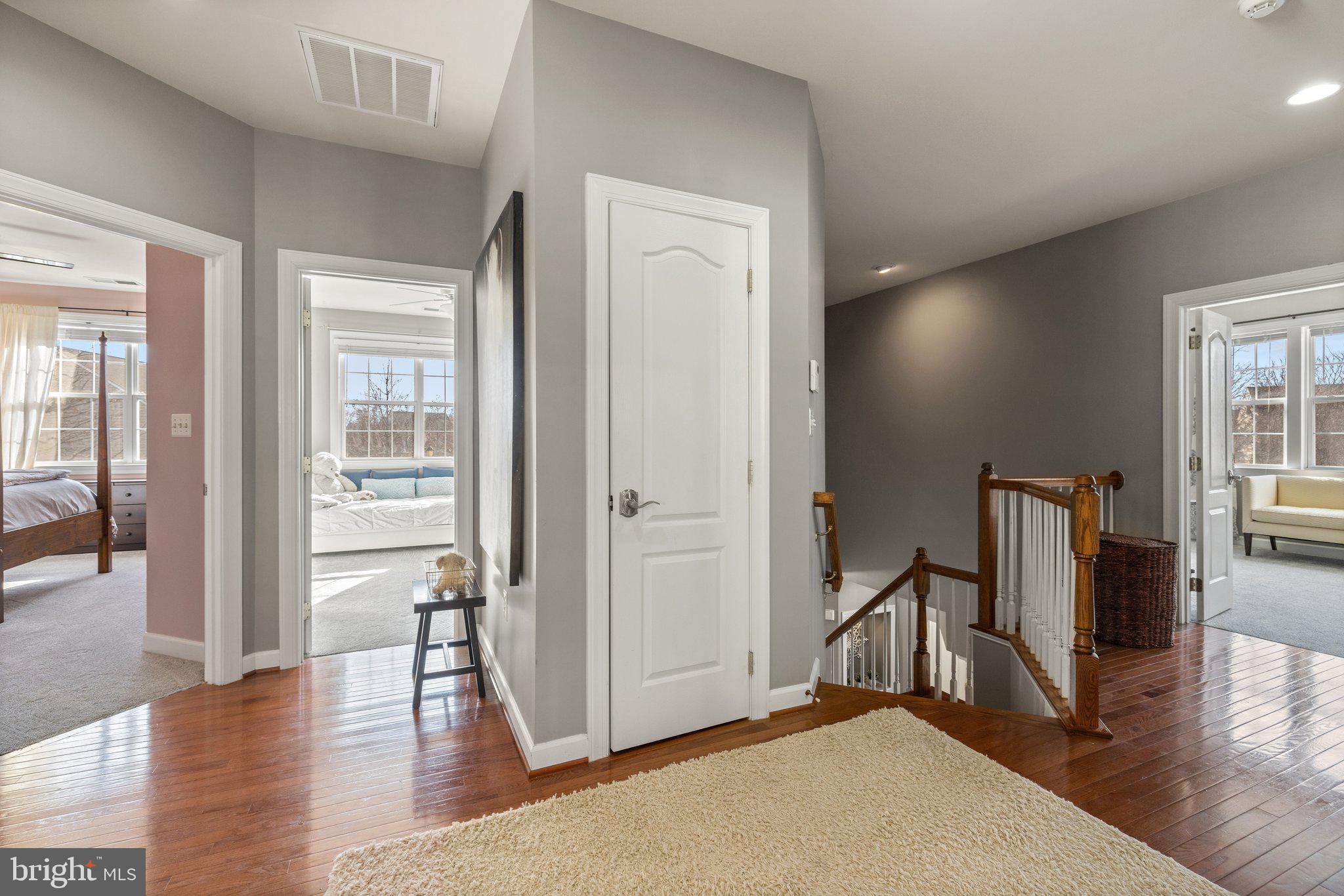 42624 Emperor Ashburn, VA 20148 - Photo 22 of 56 a view of a livingroom with wooden floor and a flat screen tv
