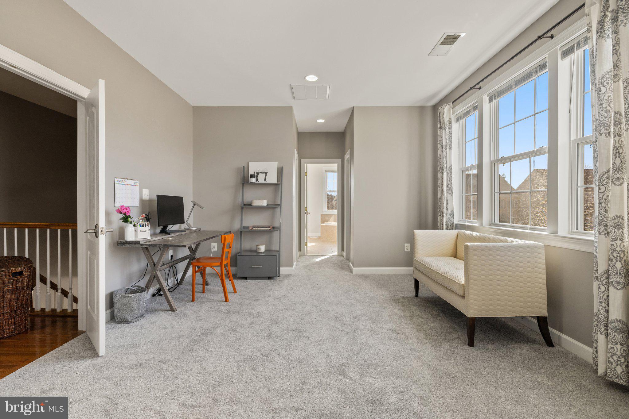 42624 Emperor Ashburn, VA 20148 - Photo 25 of 56 a living room with furniture and a flat screen tv