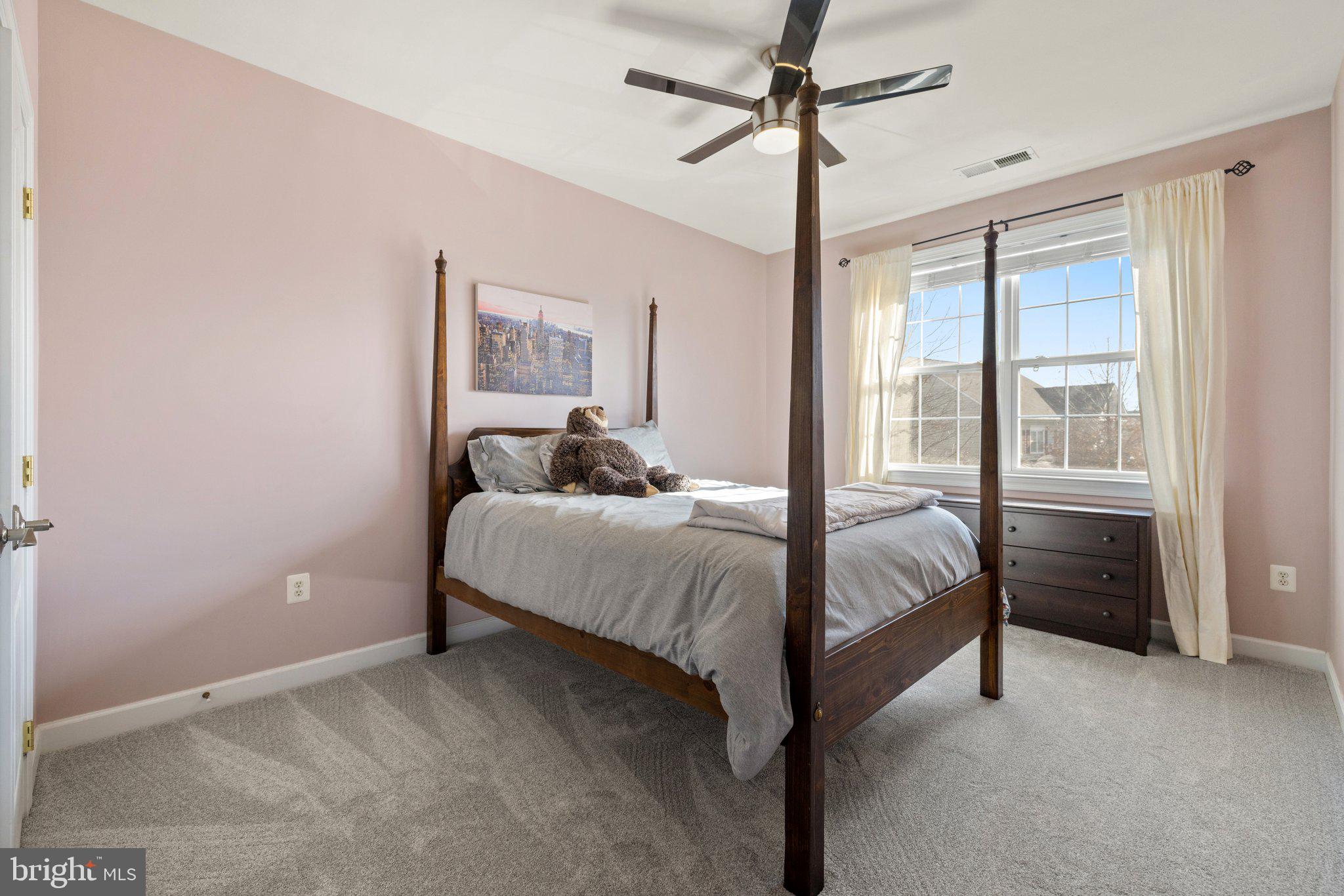 42624 Emperor Ashburn, VA 20148 - Photo 33 of 56 a bedroom with a bed and a window