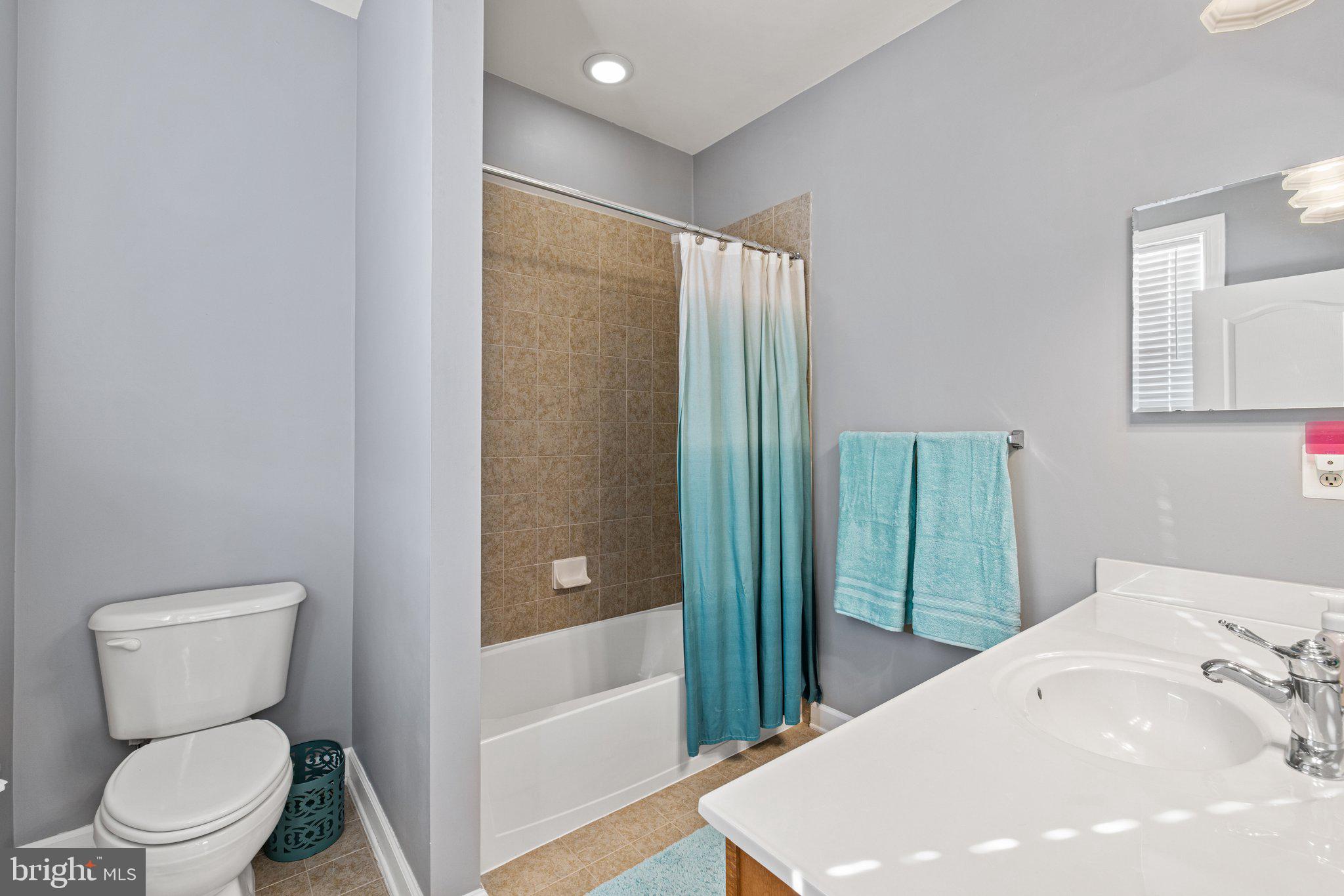42624 Emperor Ashburn, VA 20148 - Photo 35 of 56 a bathroom with a toilet and a sink