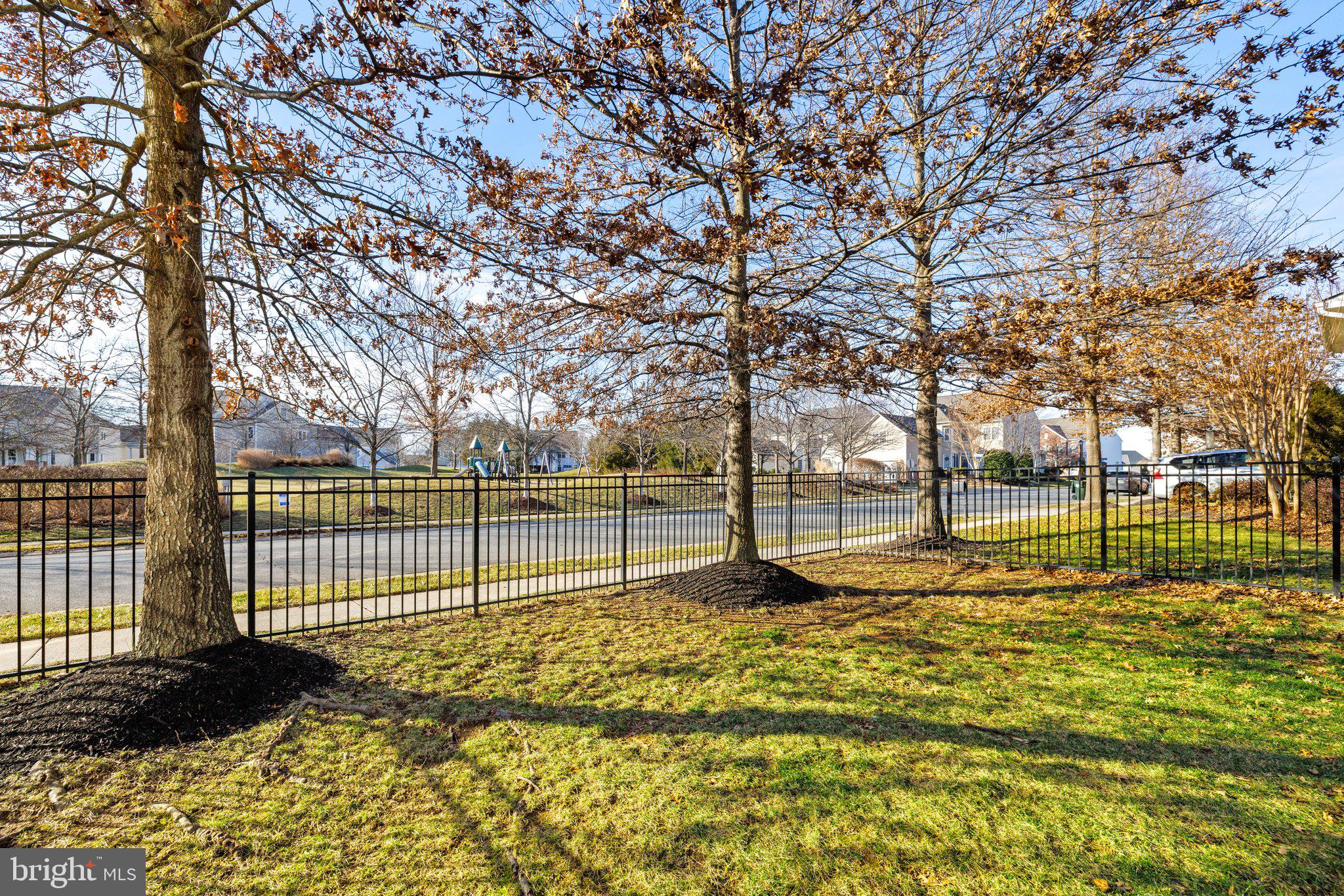42624 Emperor Ashburn, VA 20148 - Photo 45 of 56 a view of a yard with wooden fence