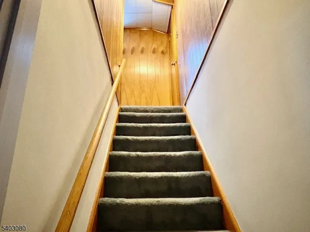 a view of a patio with iron fence