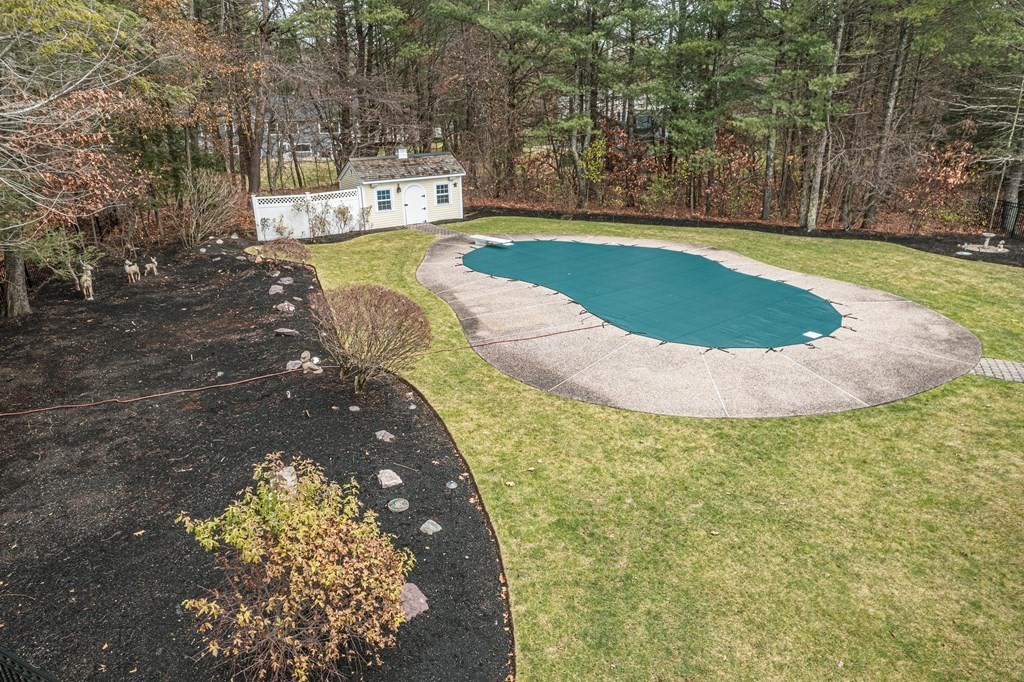 5 Rose Lane Boxford, MA 01921 - Photo 8 of 8 a swimming pool with trees in the background