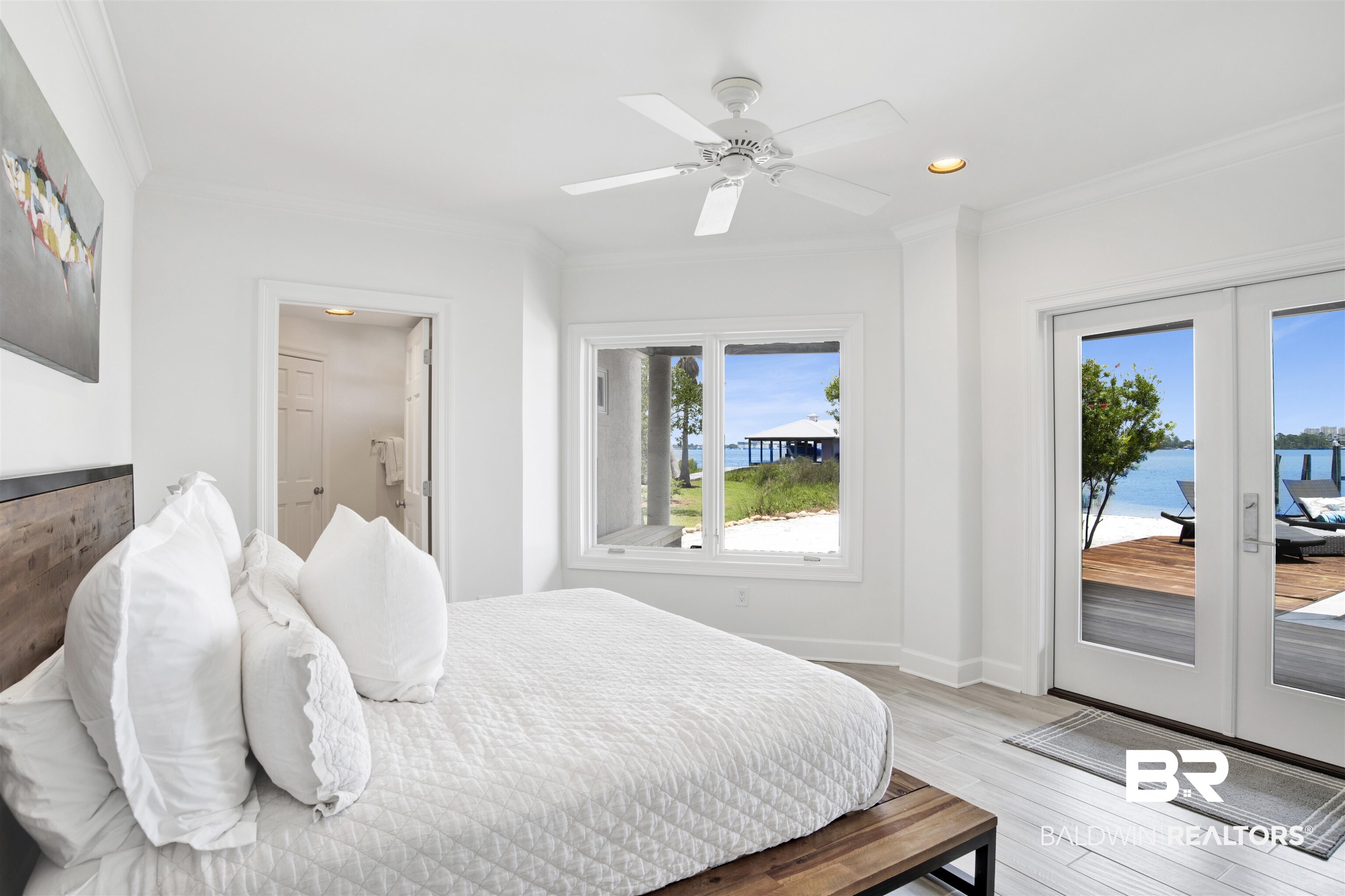 33400 River Road Orange Beach, AL 36561 - Photo 44 of 72 Bedroom with ceiling fan, light wood-type flooring, ornamental molding, access to outside, and french doors
