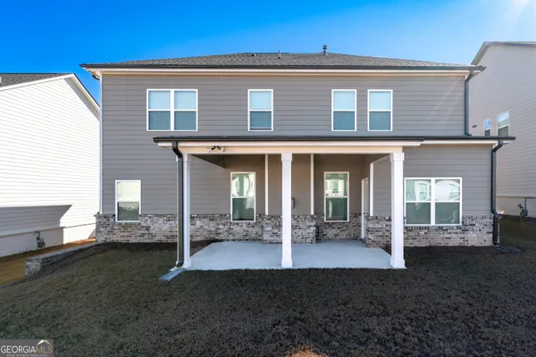 a front view of a house with a porch