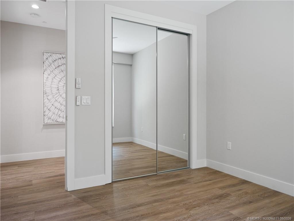 41 Southwest Seminole Street, Unit 208 Stuart, FL 34994 - Photo 32 of 46 a view of wooden floor