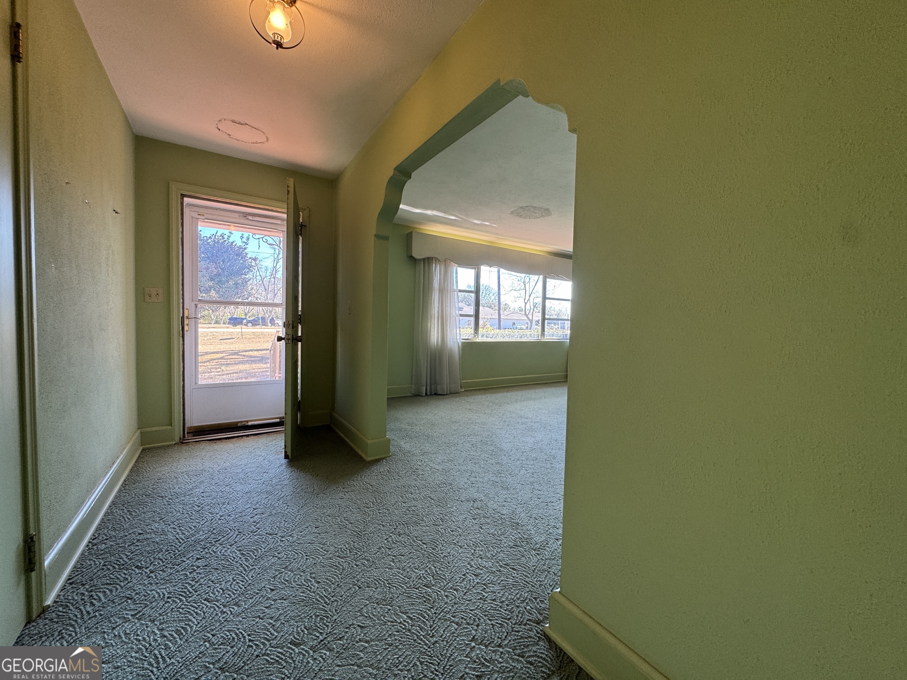 465 Cedar Street Metter, GA 30439 - Photo 36 of 47 an empty room with windows