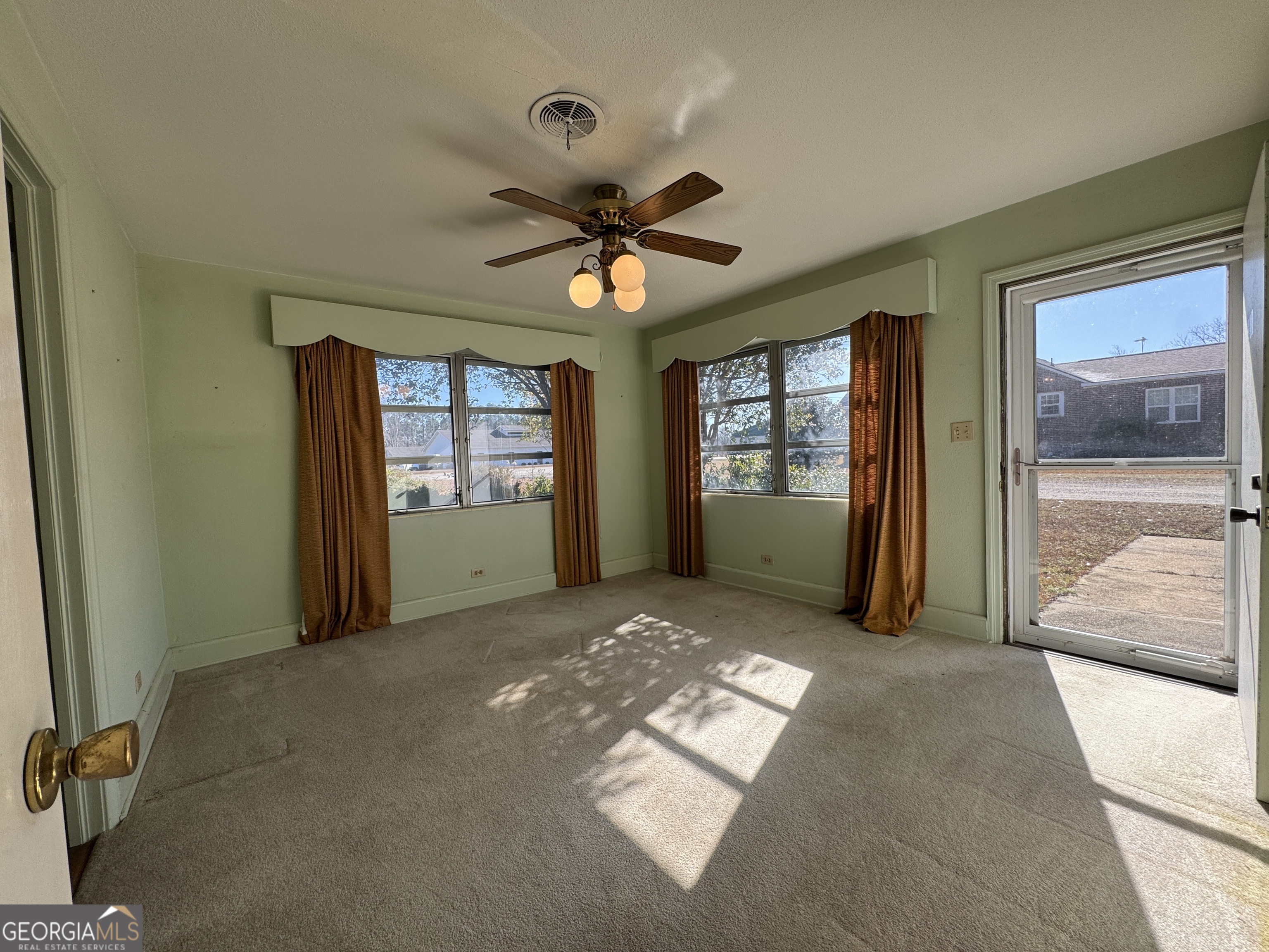 465 Cedar Street Metter, GA 30439 - Photo 41 of 47 a view of livingroom with window