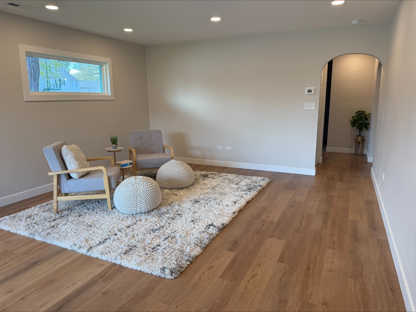 289 Chestnut Street Antioch, IL 60002 - Photo 7 of 24 a living room with furniture and a wooden floor