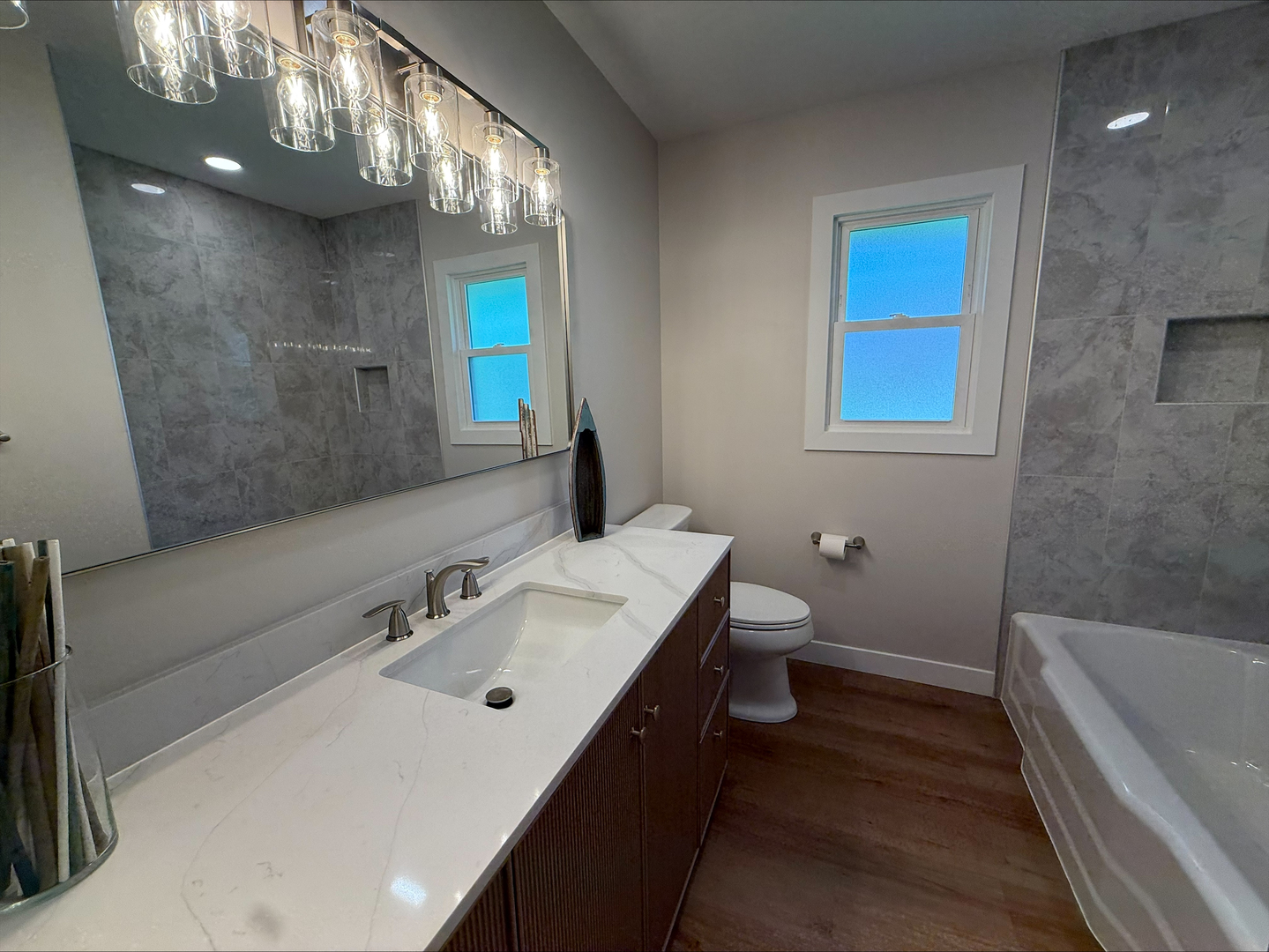 289 Chestnut Street Antioch, IL 60002 - Photo 8 of 24 a bathroom with a sink a toilet and shower