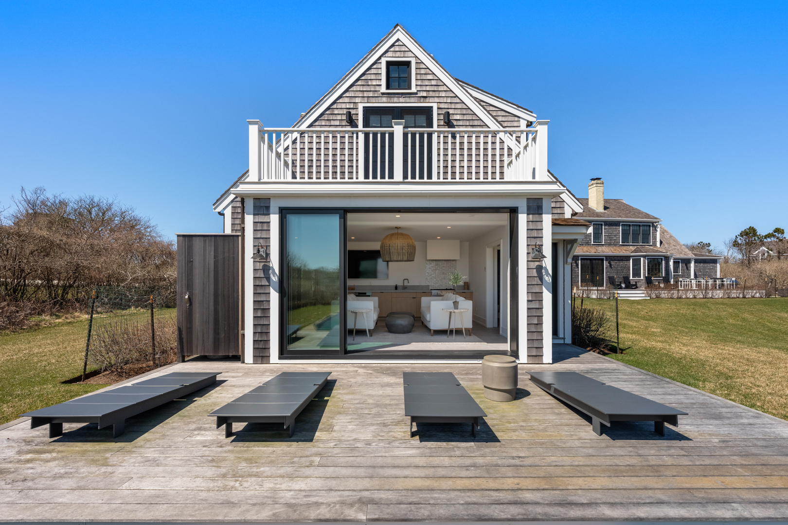 174 Cliff Road Nantucket, MA 02554 - Photo 35 of 49 a front view of a house with swimming pool