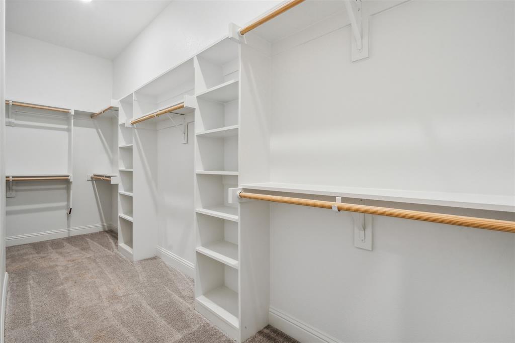 191 Lucky Ridge Lane Boyd, TX 76023 - Photo 20 of 38 a view of walk in closet with empty racks