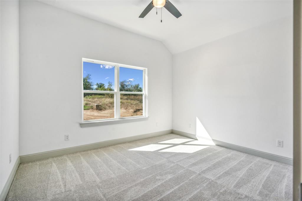191 Lucky Ridge Lane Boyd, TX 76023 - Photo 27 of 38 an empty room with windows