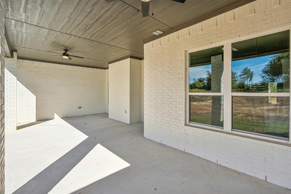 191 Lucky Ridge Lane Boyd, TX 76023 - Photo 28 of 38 a view of a house with a porch