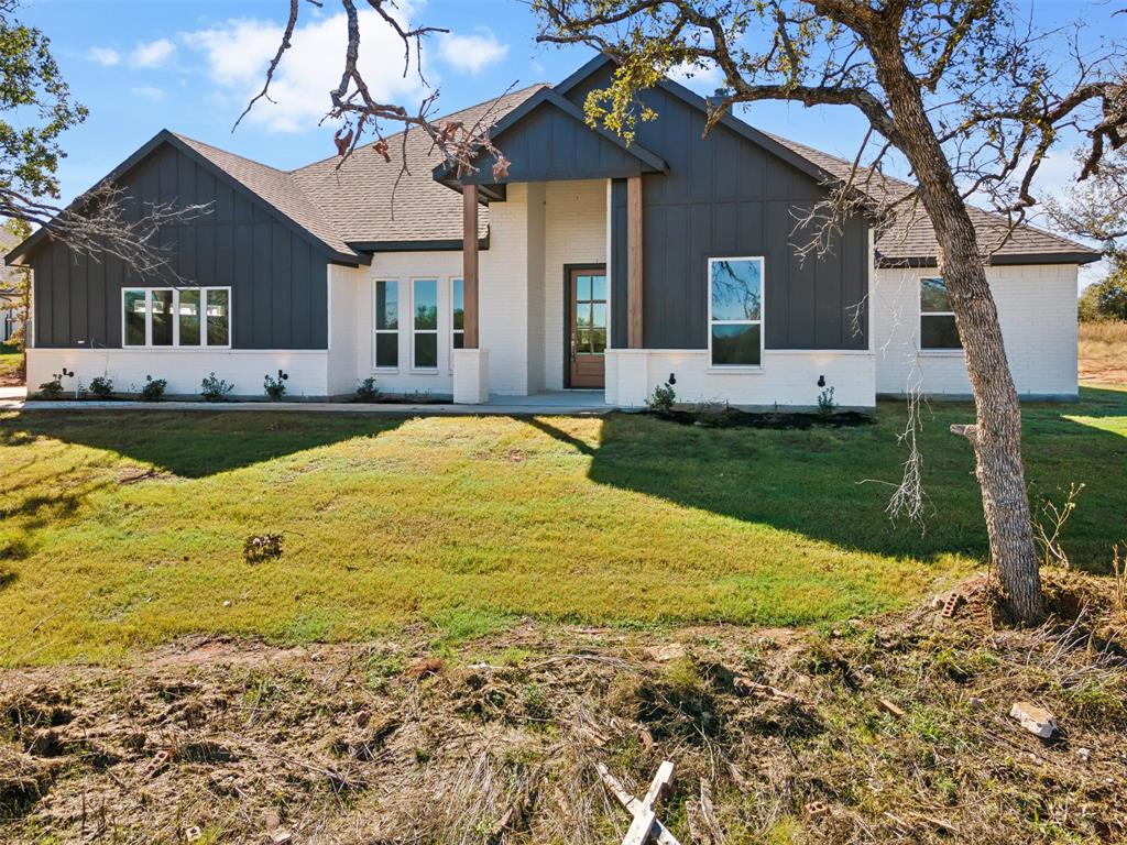 191 Lucky Ridge Lane Boyd, TX 76023 - Photo 32 of 38 a view of a house with a swimming pool